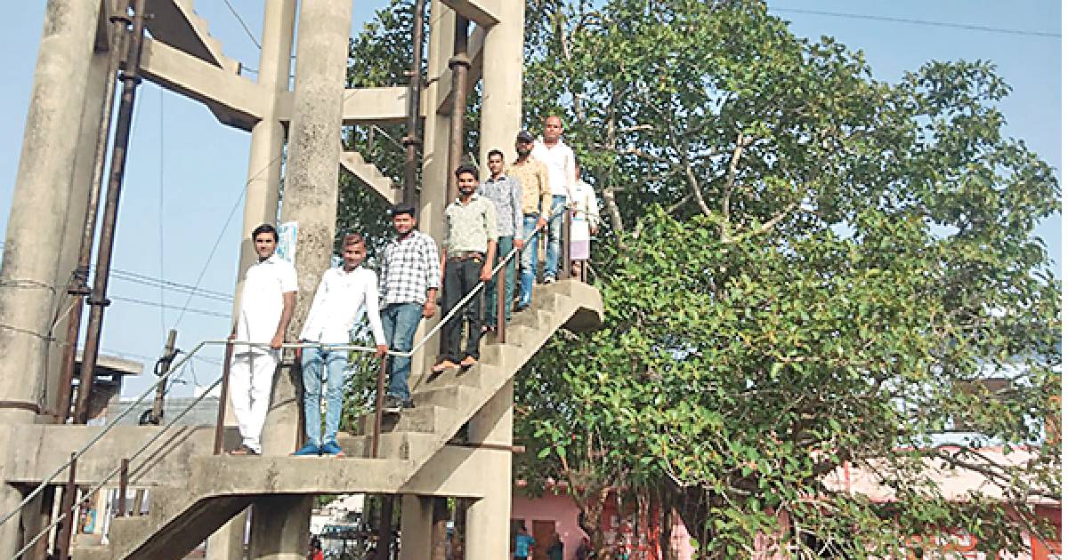 BJP councillors climb water tank in protest